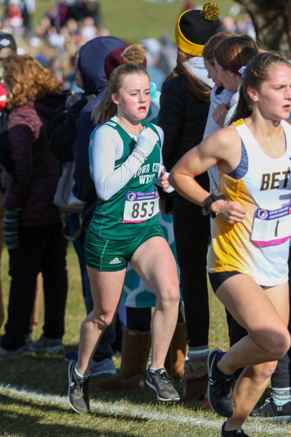 Camden Zirker '22 attacks a hill during the state cross country meet on Nov. 2 in Fort Dodge.