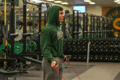 Varsity wrestler Will Hoeft 20 jumps ropes during his open period as part of his weight cutting process. Hoeft placed sixth at the Iowa high school state wrestling meet last year competing with a torn ACL.