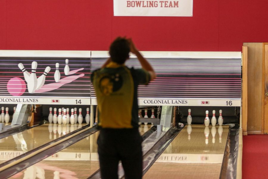 Ryan Bys '22 reacts to his bowl leaving four pins on Nov. 26 at Colonial Lanes against City High.