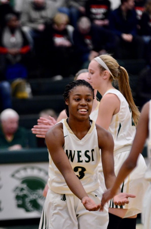 Matayia Tellis '21 is introduced during starting lineups against Linn-Mar on Dec. 20.