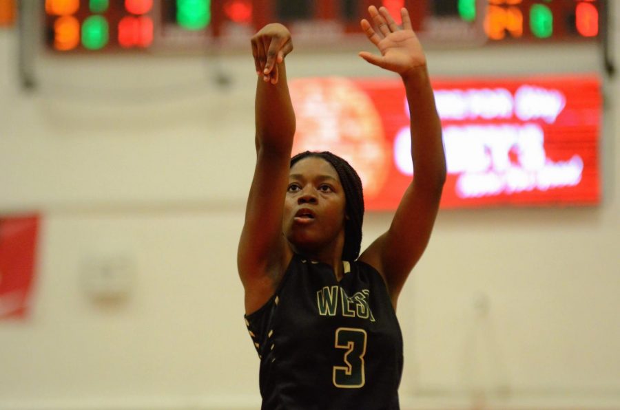 Matayia Tellis '21 shoots a free throw against City on Dec. 14.