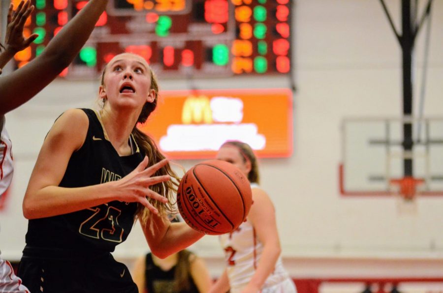 Audrey Koch '21 goes up for a layup against City on Dec. 14.