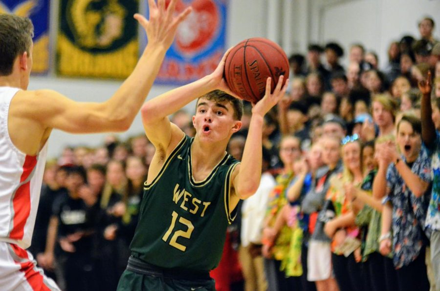 Joe Goodman '20 looks to pass inside against City on Dec. 14.