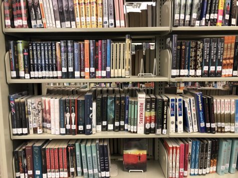 In addition to school IDs allowing students to check out books from the West High library pictured above, they will now work at the Coralville, Iowa City and North Liberty public libraries. 