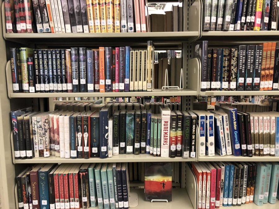 In addition to school ID's allowing students to check out books from the West High library pictured above, they will now work at the Coralville, Iowa City and North Liberty public libraries. 