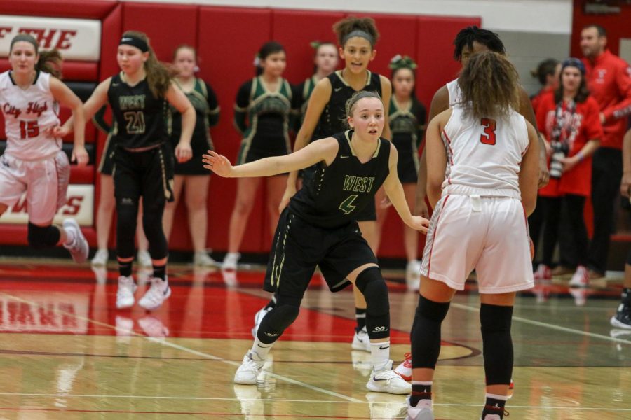 Cora Saunders '20 guards City High's Rose Nkumu '20 on Dec. 14.