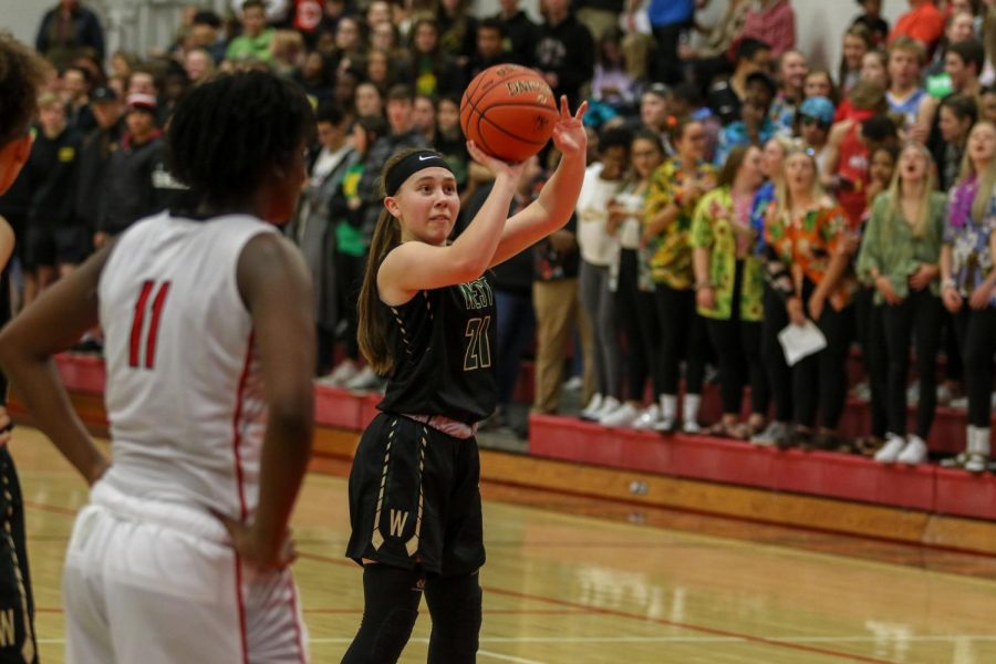 Jenna Saunders '21 knocks down a free throw against City on Dec. 14.