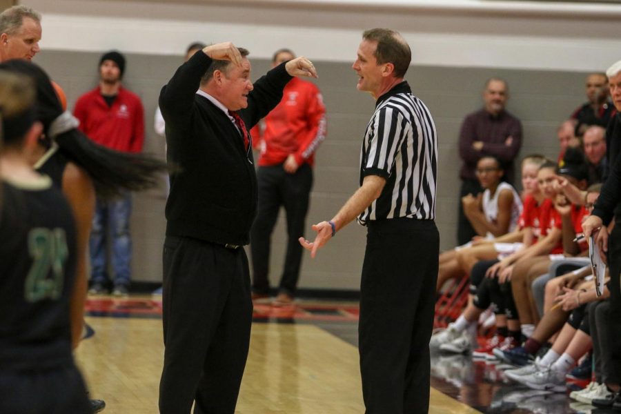 City High head coach Bill McTaggart argues a call on Dec. 14.