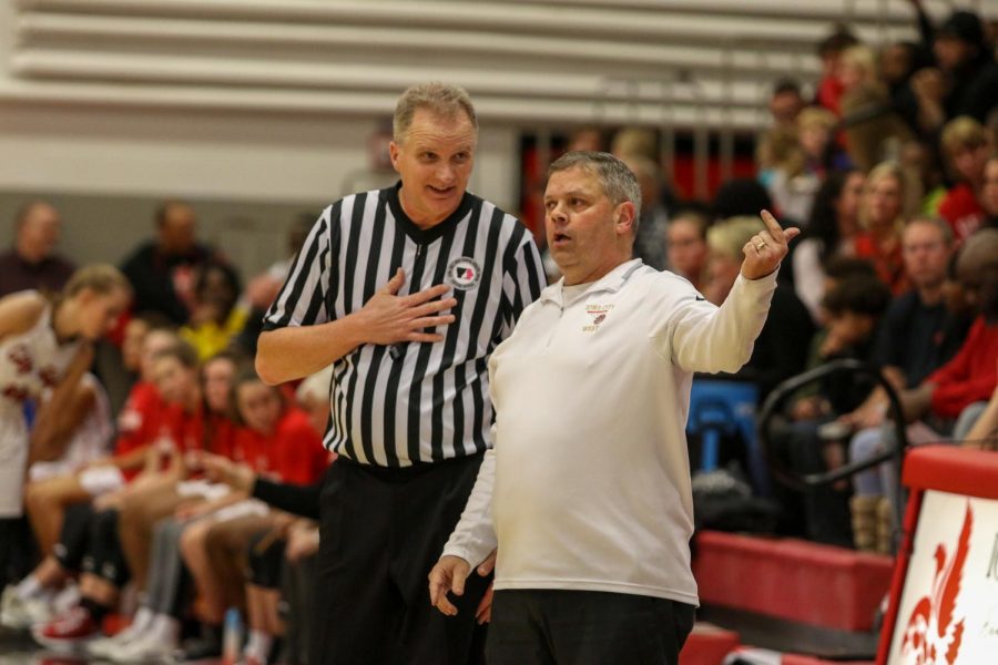 Head coach Bj Mayer talks with the referee about a call against City on Dec. 14.