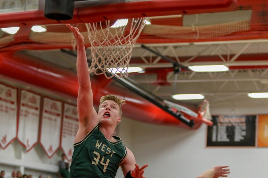 Even Brauns '20 goes up for a layup against City on Dec. 14.