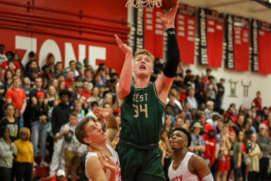 Even Braun '20 gets past a defender for a layup against City on Dec. 14.