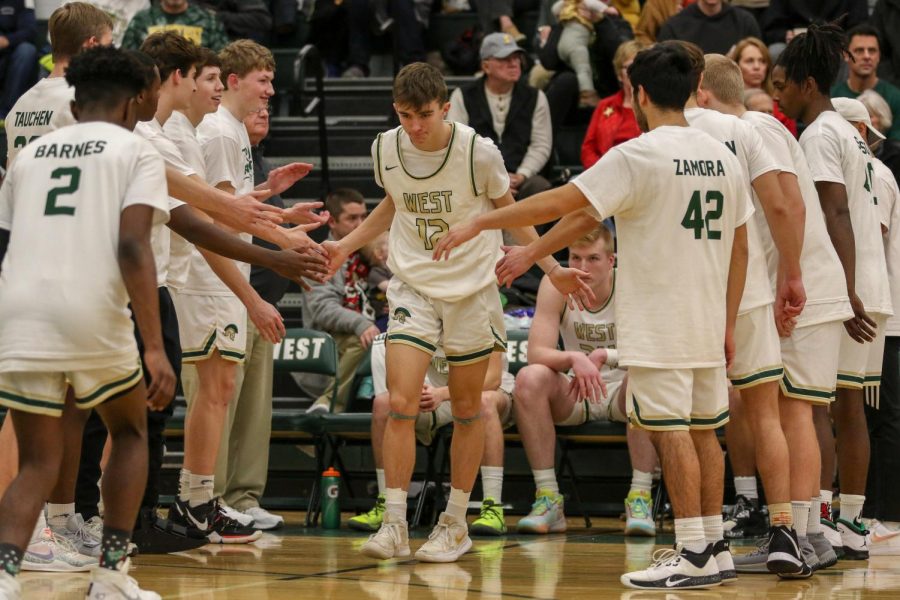 Joe Goodman '20 is introduced during starting lineups against Linn-Mar on Dec. 20.