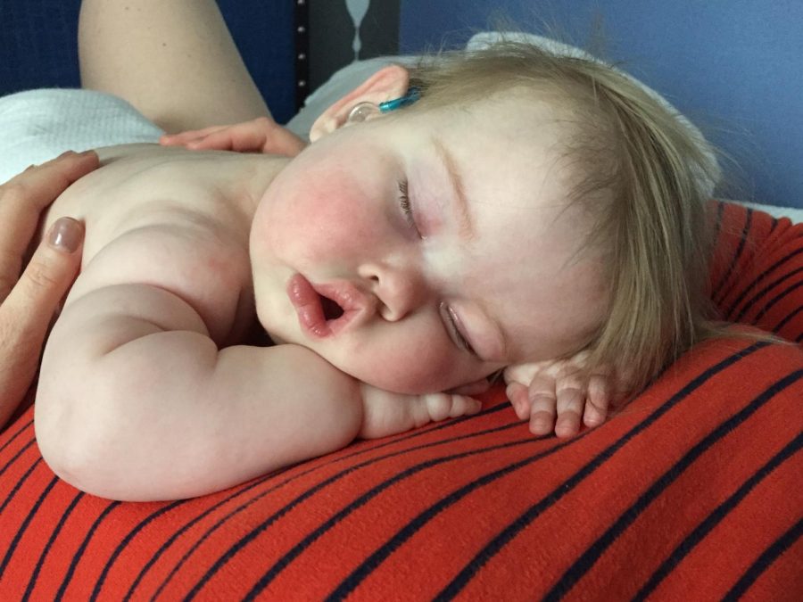 Sarah Boylan holding her daughter, Emilia Emmie Boylan, as she sleeps.