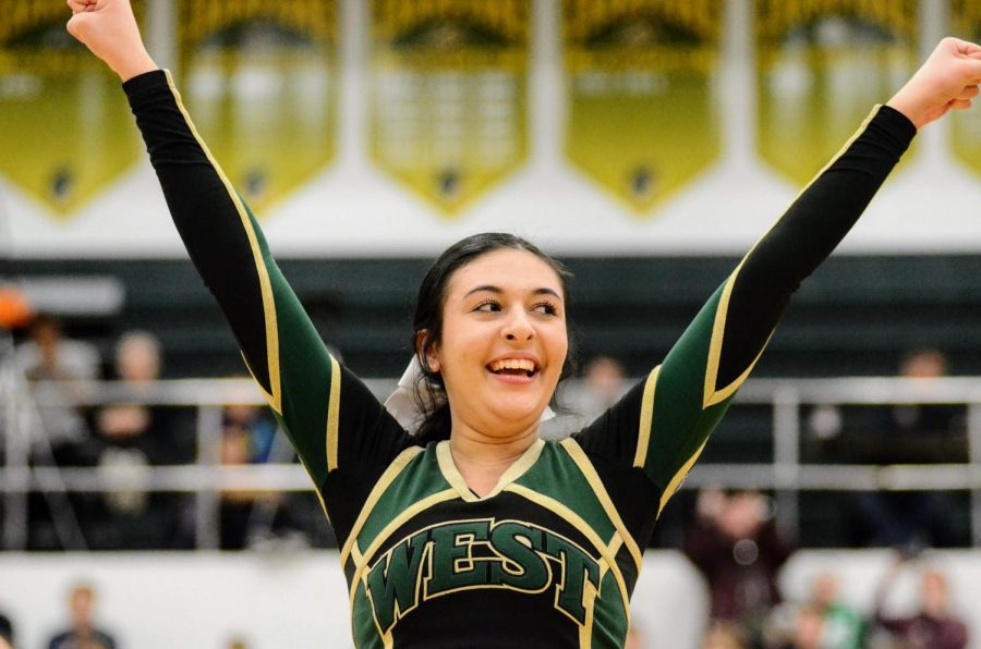 Adriana Causevic '23 cheers at halftime on Jan. 21.