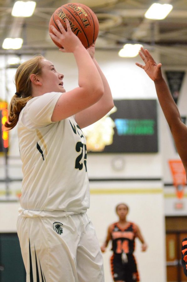 Katelynn Hillberry '20 takes a shot right outside of the freethrow lane on Jan. 15.