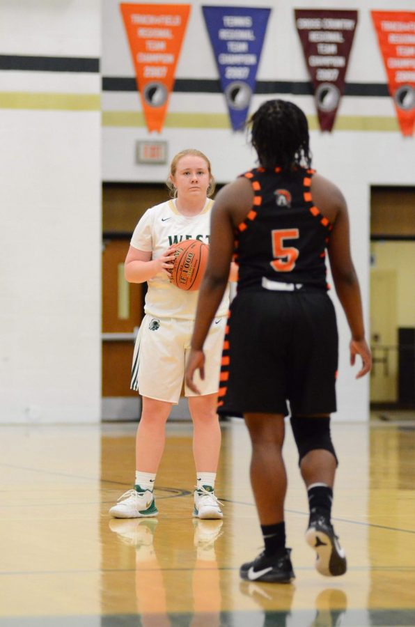 Katelynn Hillberry '20 holds possession of the ball in the last 30 seconds of the game on Jan. 15., resulting in a Women of Troy victory. 