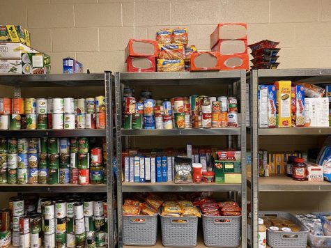 The shelves in room 147 are stocked with canned and non-perishable food. 