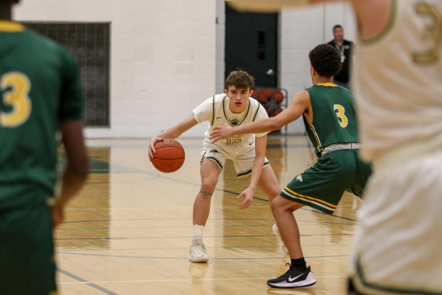 Joe Goodman '20 looks to start the offense early in the game against Dubuque Hempstead on Jan. 7.