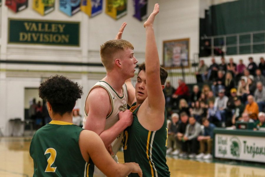 Even Brauns '20 is double teamed on an inbounds against Dubuque Hempstead on Jan. 7.