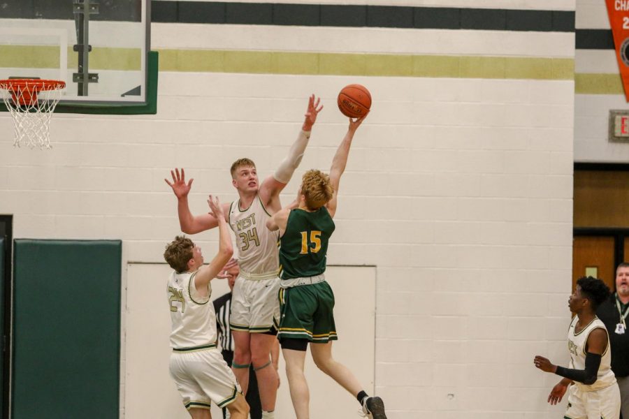 Even Brauns '20 reaches for a block against Dubuque Hempstead on Jan. 7.