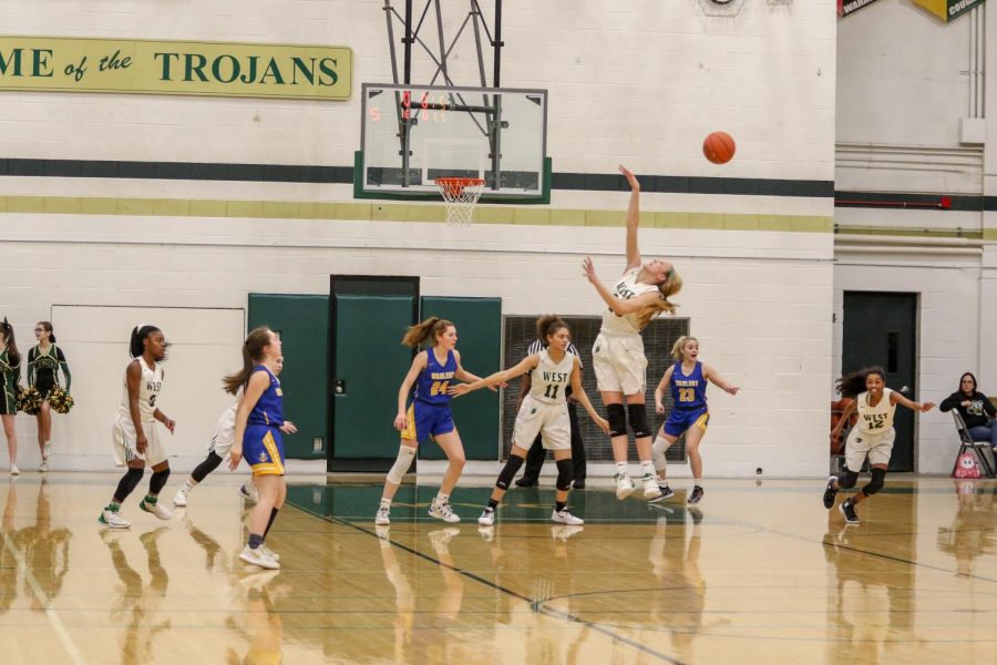 Audrey Koch '21 deflects a pass as the Women of Troy run a half court trap against Dubuque Wahlert on Jan. 28.