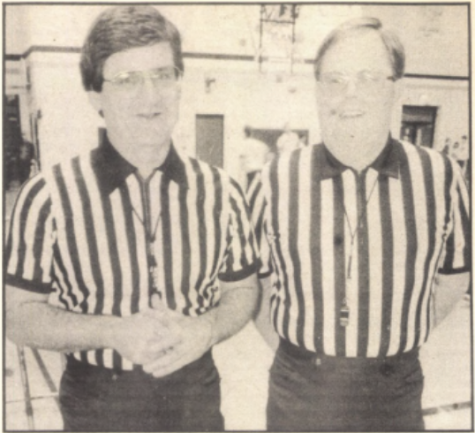 Referees chat before yet another exciting game in the West  High Gym.