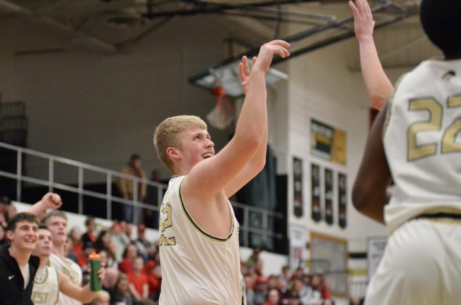 Aidan Terrill ‘21 takes a three point shot in the fourth quarter. 