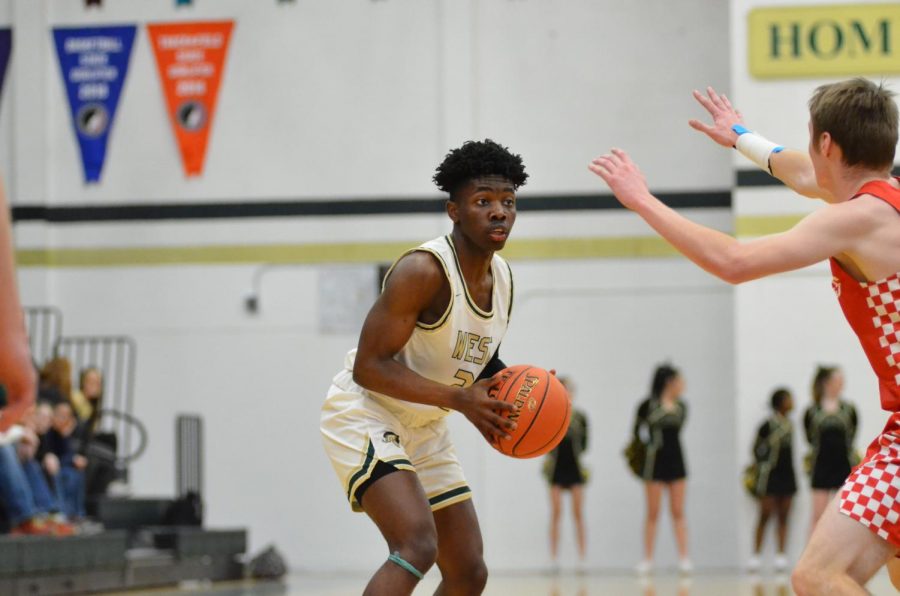 Christian Barnes '22 pauses to find an open teammate. 