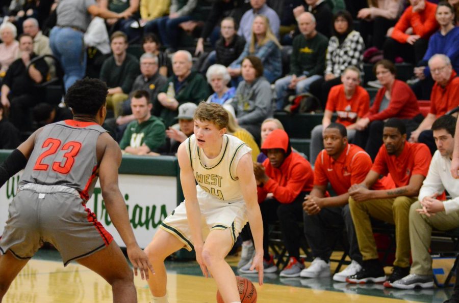 Ben VanderLeest '20 controls the ball while the Trojans set up offense to score a point Jan. 31. 