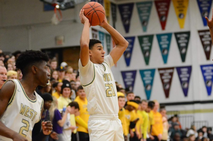 Marcus Morgan '20 gives a long pass to his teammate on the other end of the court. 