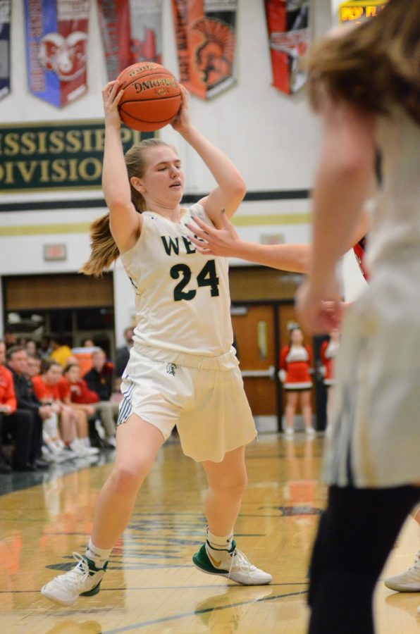 Ana Prouty '23 plays an aggressive offense against City's Aubrey Jones '20. 