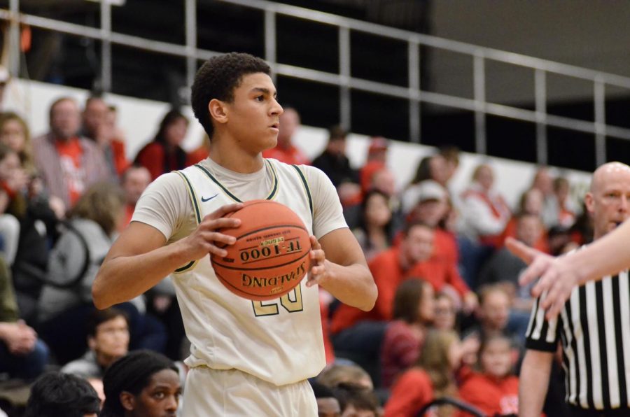 Marcus Morgan ‘21 looks down the lane for a teammate to pass to.