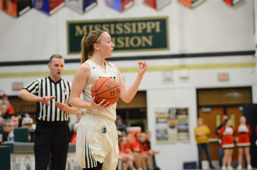 Cora Saunders '20 signals to her teammate to come and get the ball on Jan. 31. 