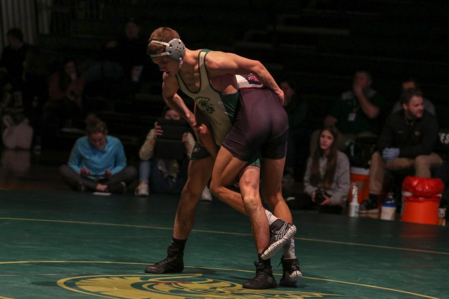 Graham Gambrall '21 earns a point for his opponent's stalling Feb. 6. Gambrall pinned Waterloo West's Jackson Hicks '20 in the second period.