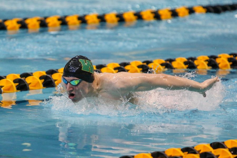 Jordan Christensen '22 swims the butterfly in the 200 yard IM on Feb. 15.