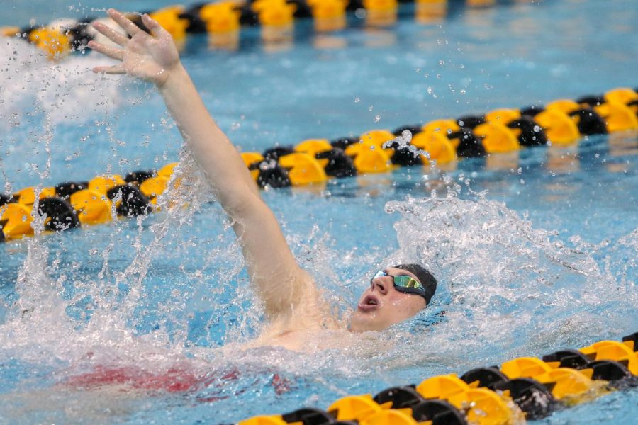 Jordan Christensen '22 swims in the 200 yard IM on Feb. 15. Christensen finished with a time of 1:54.98.