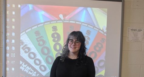 Paraeducator Farren Kerr poses for Wheel of Fortune submission photo.