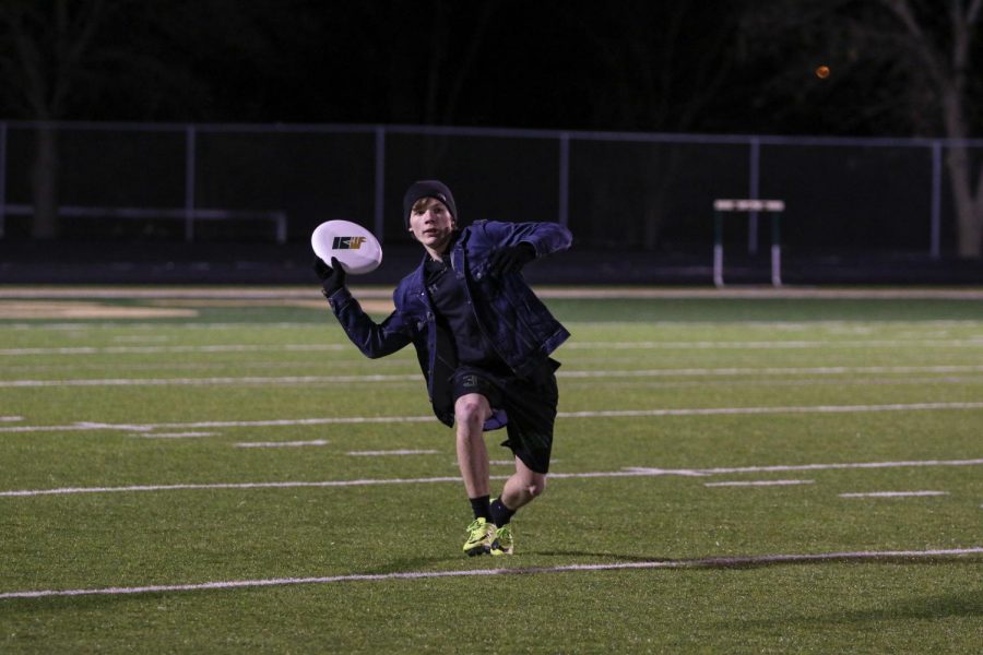 Liam Edberg '23 looks to pass ahead during the team's scrimmage on March 6.