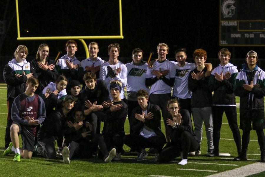 West Highs ultimate frisbee team poses for a photo after their practice Mar 6.