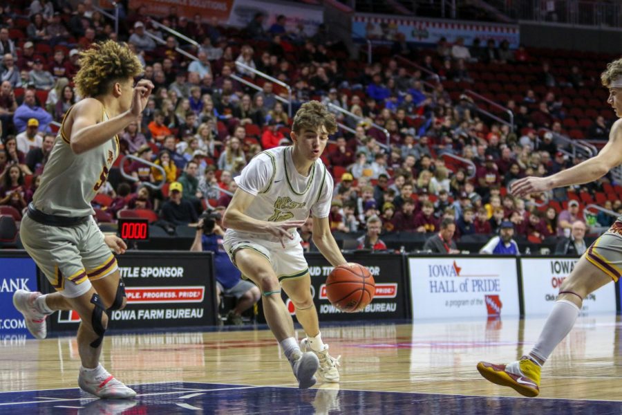 Joe Goodman '20 drives into the lane during the state quarterfinal on March 11.