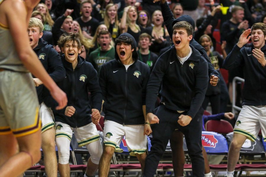 The bench celebrates a Nick Pepin '20 and-one during the state quarterfinal on March 11.