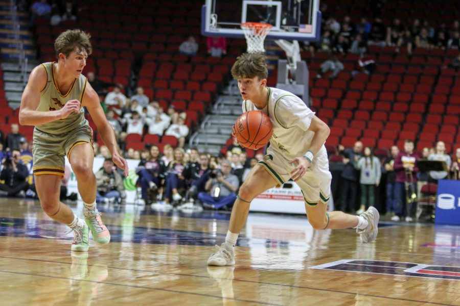 Joe Goodman '20 looks to score on a fast break during the state quarterfinal on March 11.