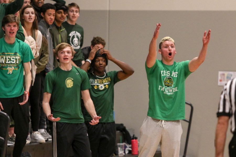 The student section questions a call against Pleasant Valley on March 3.