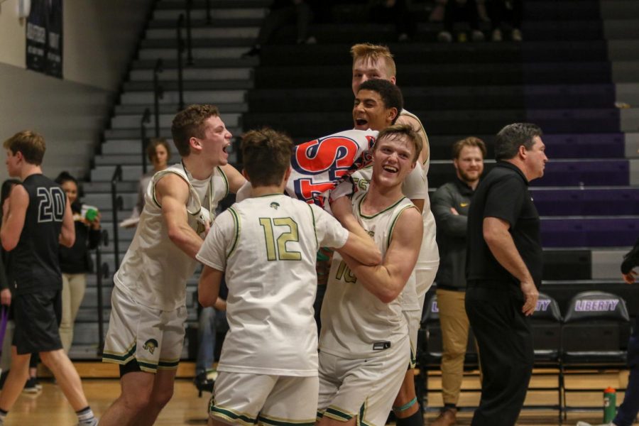 The team celebrates their substate final win against Pleasant Valley on March 3.