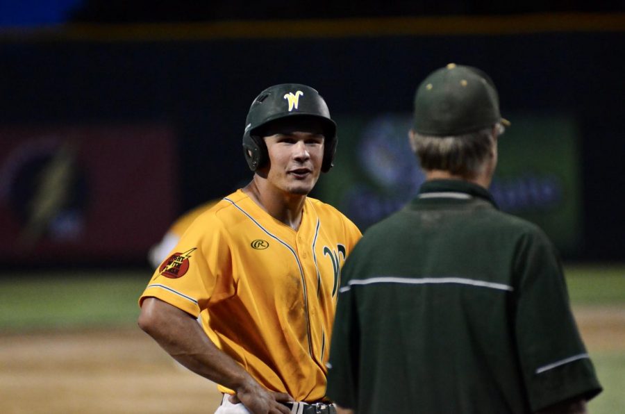 Will Hoeft '20 chats with Coach Stumpff after hitting a triple.