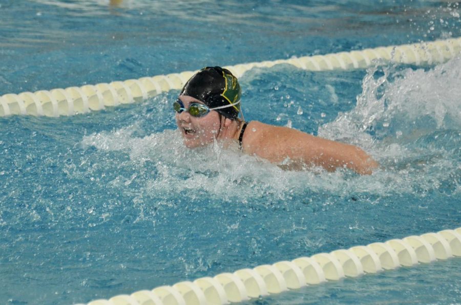 Lauren Maras 22 swims the butterfly for the 200 medley relay Sept. 29. 