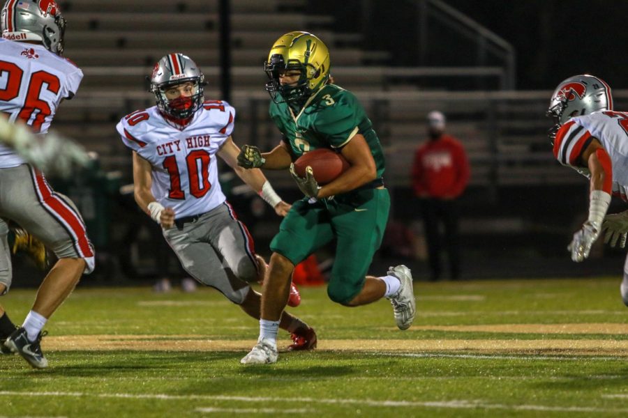 Trey King '21 looks for a block during the Battle for the Boot on Sept. 4