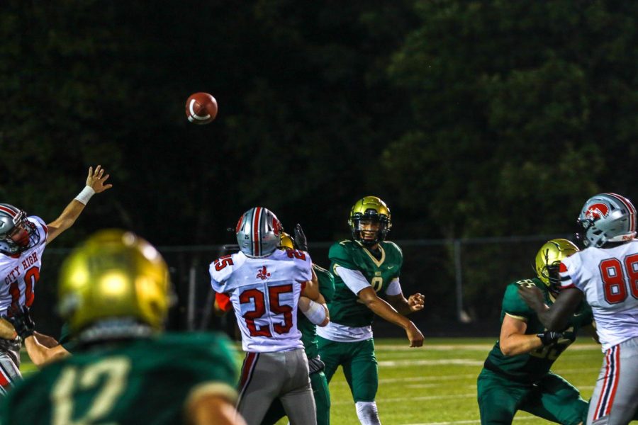 Marcus Morgan '21 throws the ball down field during the Battle for the Boot on Sept. 4.