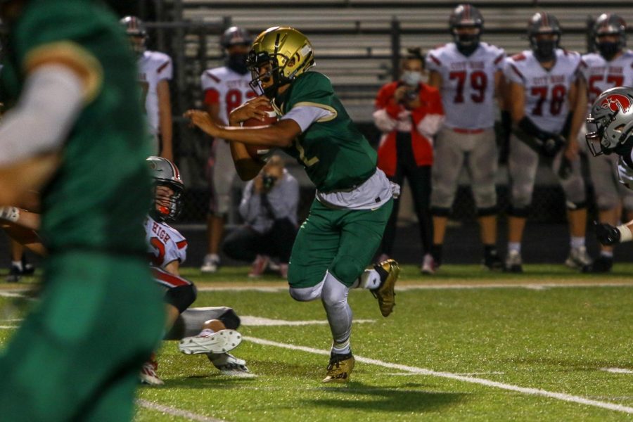 Marcus Morgan '21 makes a man miss during the Battle for the Boot on Sept. 4.