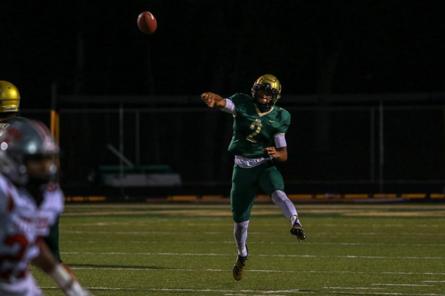 Marcus Morgan '21 launches a pass down field during the Battle for the Boot on Sept. 4.